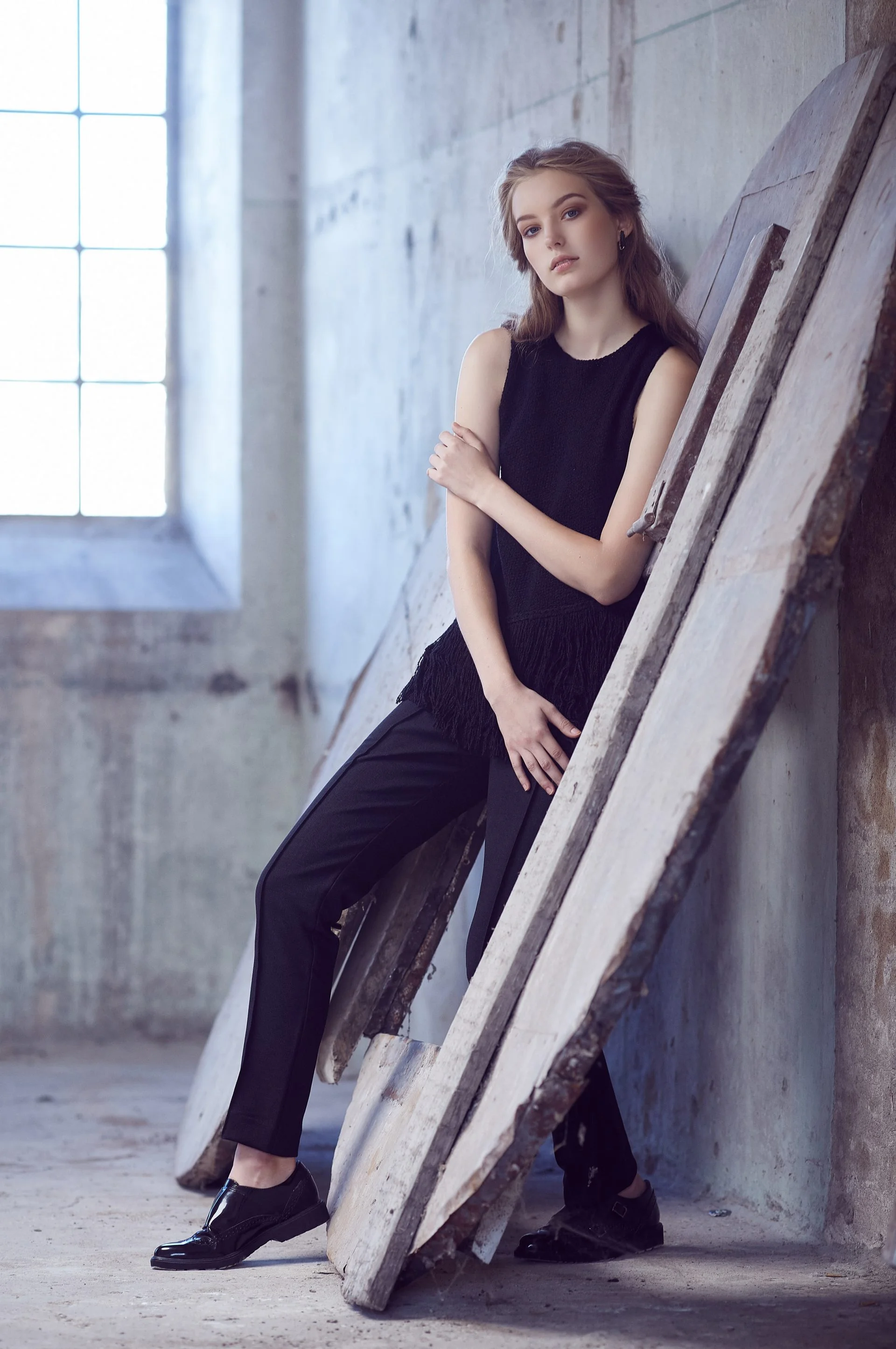 Female in a black costume.