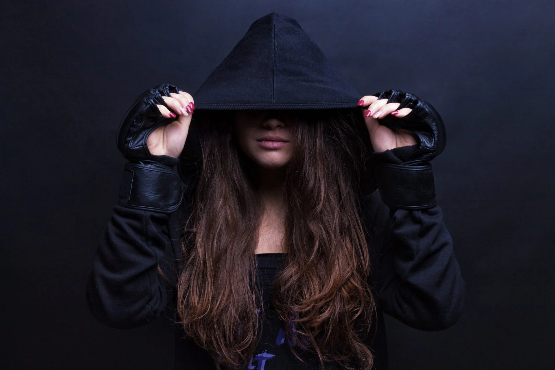 Young model wearing sports hooded sweatshirt